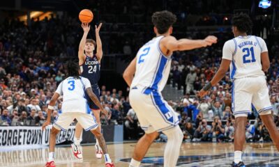 UConn guard Braylon Mullins (24) scores the winning basket during the second half against Duke in the Elite Eight of the NCAA college basketball tournament, Sunday, March 29, 2026, in Washington. (AP Photo/Abbie Parr)