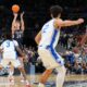 UConn guard Braylon Mullins (24) scores the winning basket during the second half against Duke in the Elite Eight of the NCAA college basketball tournament, Sunday, March 29, 2026, in Washington. (AP Photo/Abbie Parr)