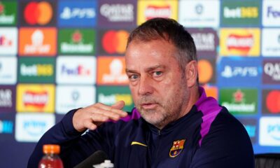 Barcelona manager Hansi Flick attends a press conference at St. James' Park, Newcastle upon Tyne, England, Monday March 9, 2026, ahead of the Champions League soccer match between Newcastle United and Barcelona on Tuesday. (Owen Humphreys/PA via AP)