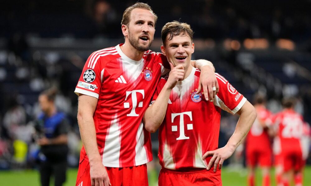 Bayern's Harry Kane, left, and teammate Joshua Kimmich look at the fans after the Champions League quarterfinal first leg soccer match between Real Madrid and Bayern Munich in Madrid, Spain, Tuesday, April 7, 2026. (AP Photo/Jose Breton)