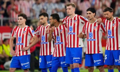 Atletico Madrid's team players react during the penalty shoot out at the Copa del Rey final soccer match between Atletico Madrid and Real Sociedad in Seville, Spain, Saturday, April. 18, 2026. (AP Photo/Jose Breton)