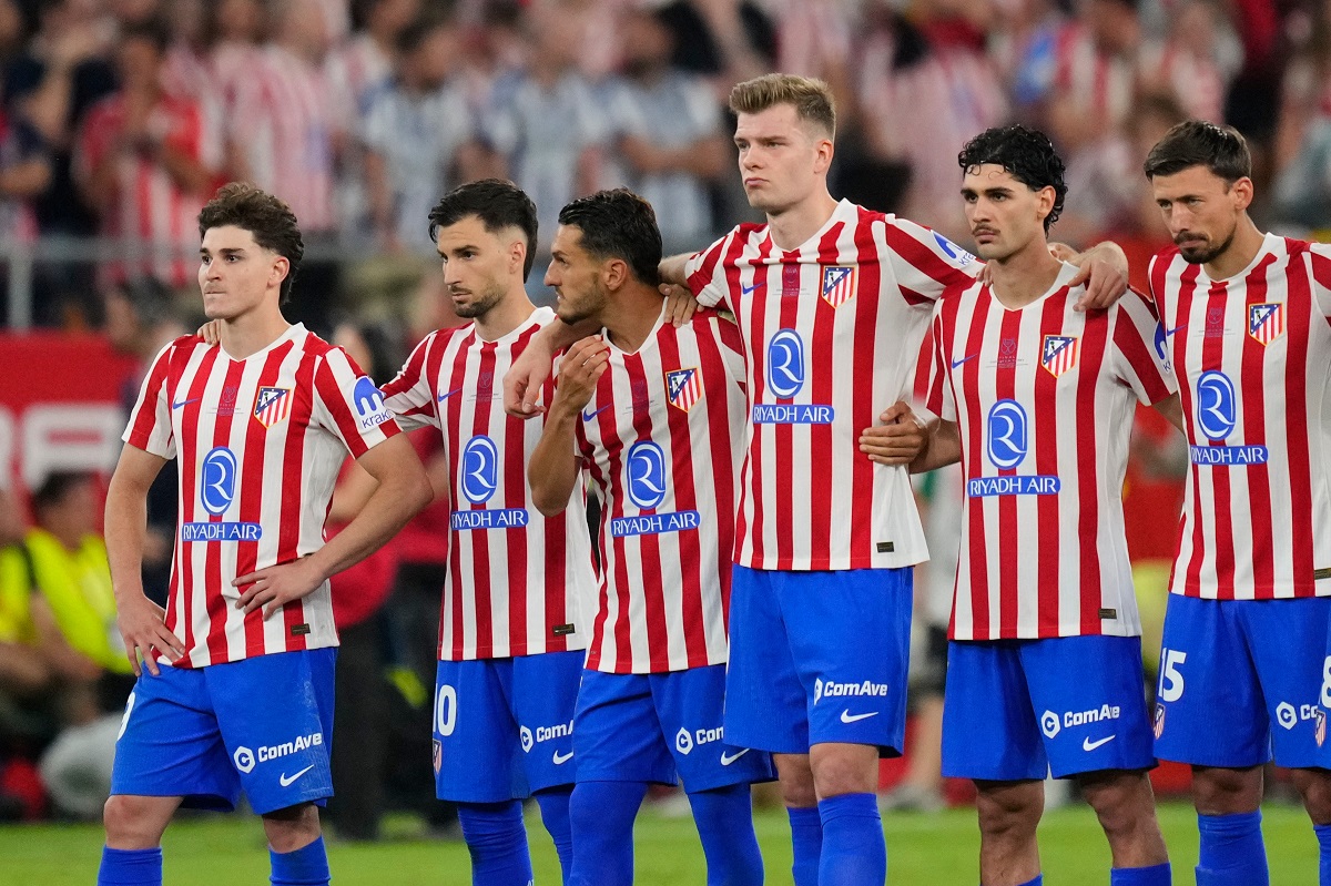 Atletico Madrid's team players react during the penalty shoot out at the Copa del Rey final soccer match between Atletico Madrid and Real Sociedad in Seville, Spain, Saturday, April. 18, 2026. (AP Photo/Jose Breton)