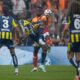 Fenerbahce's Sidiki Cherif, left, vies for th ball with Galatasaray's Davinson Sanchez during a Turkish Super Lig soccer match between Galatasaray and Fenerbahce in Istanbul, Turkey, Sunday, April 26, 2026. (AP Photo/Emrah Gurel)