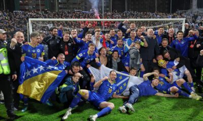 Bosnia players celebrate after winning a penalty shootout at the end of the World Cup qualifying playoff final soccer match between Bosnia and Italy in Zenica, Bosnia, Tuesday, March 31, 2026. (AP Photo/Armin Durgut)