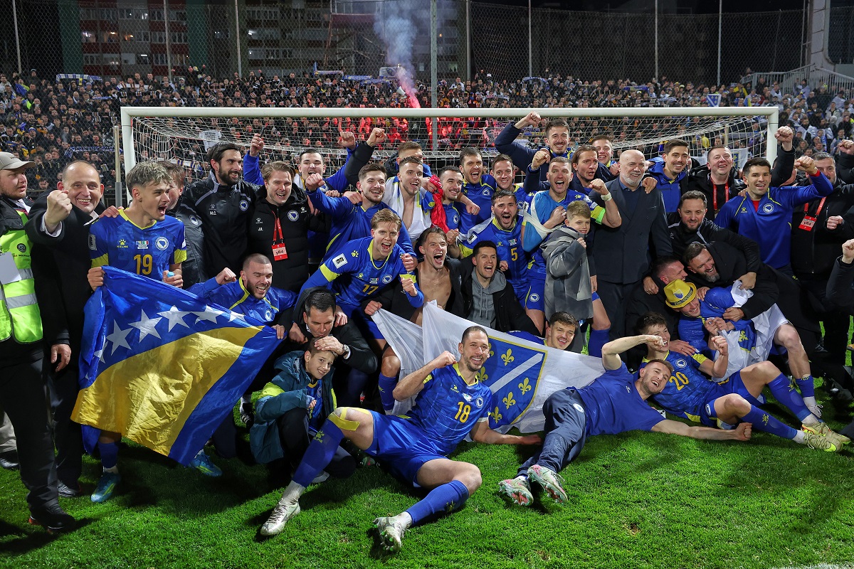Bosnia players celebrate after winning a penalty shootout at the end of the World Cup qualifying playoff final soccer match between Bosnia and Italy in Zenica, Bosnia, Tuesday, March 31, 2026. (AP Photo/Armin Durgut)