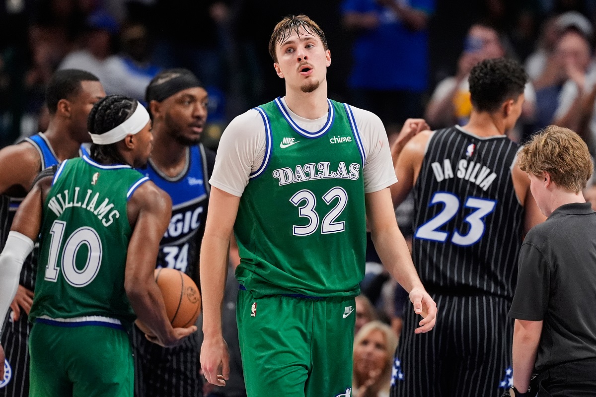 Dallas Mavericks' Cooper Flagg looks down court after sinking a basket for his 50th point of the night late in the second half of an NBA basketball game against the Orlando Magic Friday, April 3, 2026, in Dallas. (AP Photo/Tony Gutierrez)