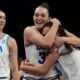 UCLA forward Angela Dugalic, second from left, embraces UCLA guard Lena Bilic (9) after defeating Texas in a women's NCAA college basketball tournament semifinal game at the Final Four, Friday, April 3, 2026, in Phoenix. (AP Photo/Ross D. Franklin)