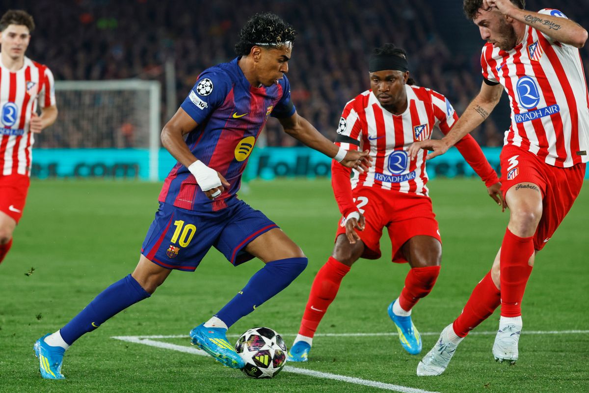 Barcelona's Lamine Yamal in action against Atletico Madrid's Matteo Ruggeri, left, and Atletico Madrid's Ademola Lookman during the Champions League quarterfinal first leg soccer match between Barcelona and Atletico Madrid in Barcelona, Spain, Wednesday, April 8, 2026. (AP Photo/Joan Monfort)