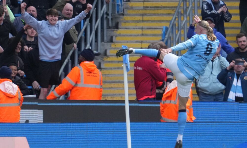 Manchester City's Erling Haaland celebrates after scoring during the FA Cup quarter-final soccer match between Manchester City and Liverpool in Manchester, England, Saturday, April 4, 2026. (AP Photo/Jon Super)