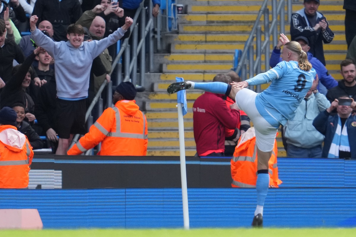 Manchester City's Erling Haaland celebrates after scoring during the FA Cup quarter-final soccer match between Manchester City and Liverpool in Manchester, England, Saturday, April 4, 2026. (AP Photo/Jon Super)