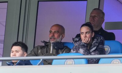 Manchester City's head coach Pep Guardiola watchs from the stand during the FA Cup quarter-final soccer match between Manchester City and Liverpool in Manchester, England, Saturday, April 4, 2026. (AP Photo/Jon Super)