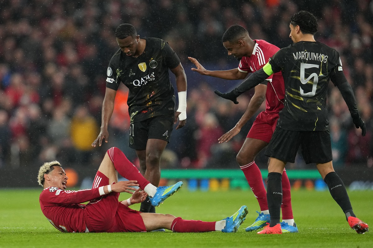 Liverpool's Hugo Ekitike lies injured during the Champions League quarterfinal second leg soccer match between Liverpool and Paris Saint-Germain in Liverpool, England, Tuesday, April 14, 2026. (AP Photo/Jon Super)