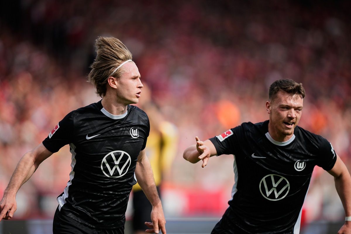 Wolfsburg's Patrick Wimmer celebrates his side's opening goal during the German Bundesliga soccer match between FC Union Berlin and Wolfsburg in Berlin, Germany, Saturday, April 18, 2026. (AP Photo/Ebrahim Noroozi)