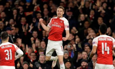FILE - Arsenal's Aaron Ramsey, center, celebrates after scoring his side's first goal during the Europa League first leg quarterfinal soccer match between Arsenal and Napoli in London, on April 11, 2019. (AP Photo/Kirsty Wigglesworth, File)