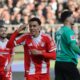 Bayern's Jamal Musiala celebrates after scoring during the German Bundesliga soccer match between FC St. Pauli and Bayern Munich in Hamburg, Germany, Saturday, April 11, 2026. (Christian Charisius/dpa via AP)
