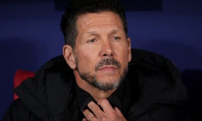 Atletico Madrid's head coach Diego Simeone looks out from the bench prior to the Champions League quarterfinal second leg soccer match between Atletico Madrid and Barcelona in Madrid, Spain, Tuesday, April 14, 2026. (AP Photo/Manu Fernandez)