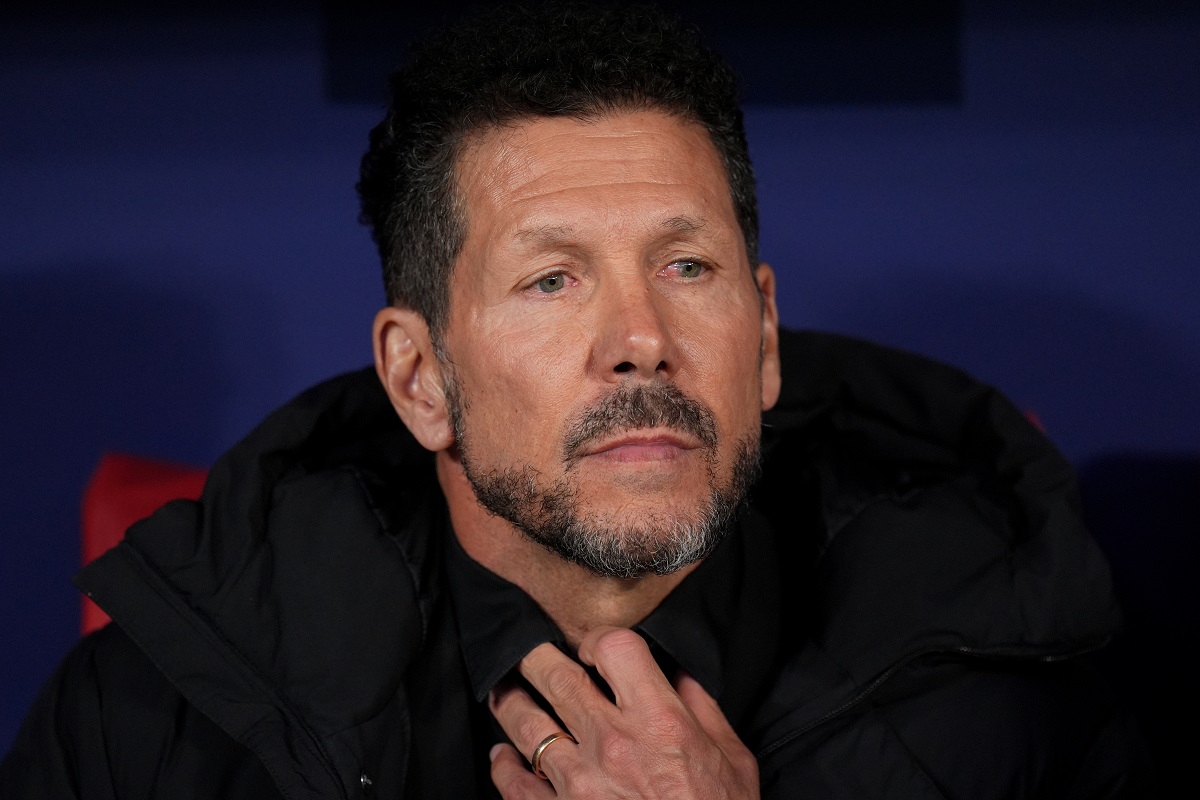 Atletico Madrid's head coach Diego Simeone looks out from the bench prior to the Champions League quarterfinal second leg soccer match between Atletico Madrid and Barcelona in Madrid, Spain, Tuesday, April 14, 2026. (AP Photo/Manu Fernandez)