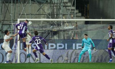 Fiorentina's Robin Everardus Gosens heads the ball to score their side's first goal of the game during the Serie A soccer match between Fiorentina and Lazio in Florence, Italy, Monday, April 13, 2026. (Massimo Paolone/LaPresse via AP)