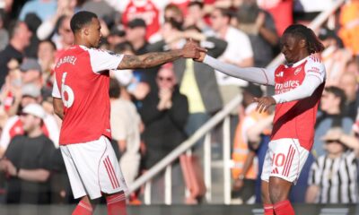 Arsenal's Eberechi Eze, right, celebrates with Arsenal's Gabriel after scoring the opening goal during the English Premier League soccer match between Arsenal and Newcastle United in London, Saturday, April 25, 2026. (AP Photo/Ian Walton)