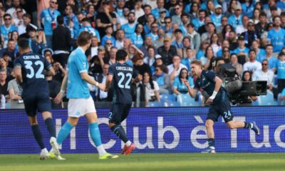 Lazio's Matteo Cancellieri, right, celebrates after scoring during the Italian Serie A soccer match between Napoli and Lazio in Naples, Italy, Saturday, April 18, 2026. (Alessandro Garofalo/LaPresse via AP)