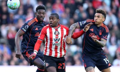 Sunderland's Noah Sadiki, center, and Nottingham Forest's Igor Jesus battle for the ball during the Premier League soccer match between Sunderland and Nottingham Forest, Friday, April 24, 2026, in Sunderland, England. (Richard Sellers/PA via AP)