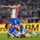 Atletico Madrid's Alexander Sorloth, top, and Real Sociedad's Jon Martin challenge for the ball during the Copa del Rey final soccer match between Atletico Madrid and Real Sociedad in Seville, Spain, Saturday, April. 18, 2026. (AP Photo/Jose Breton)