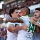 Roma's Donyell Malen, number 14, celebrates after scoring his side's first goal, during the Serie A soccer match between Bologna, in Bologna, Italy, Saturday, April 25, 2026. (Massimo Paolone/LaPresse via AP)