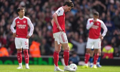 Arsenal's Declan Rice stands dejeted after conceding a goal during the Premier League soccer match between Arsenal and Bournemouth in London, England Saturday, April 11, 2026. (AP Photo/Dave Shopland)