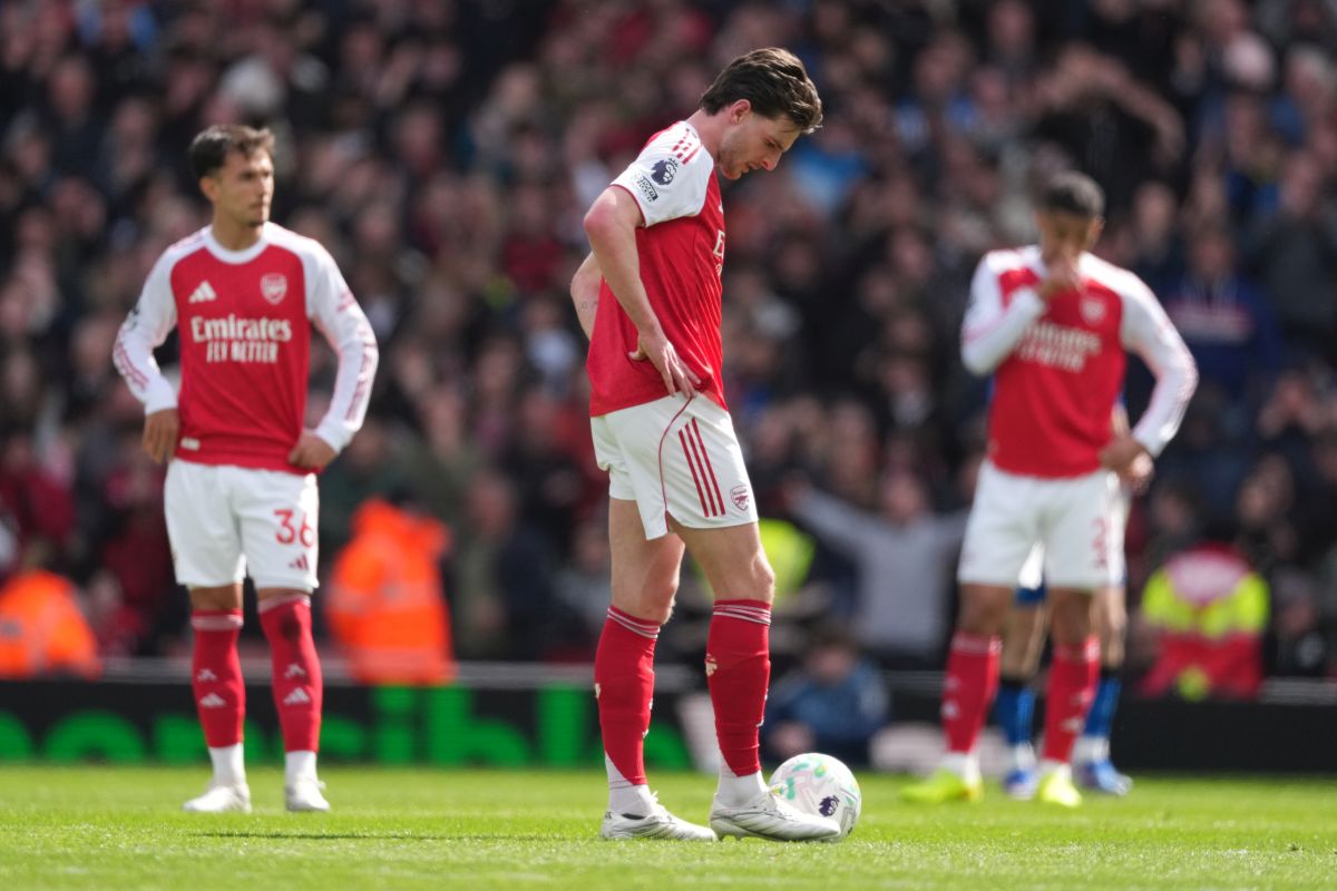 Arsenal's Declan Rice stands dejeted after conceding a goal during the Premier League soccer match between Arsenal and Bournemouth in London, England Saturday, April 11, 2026. (AP Photo/Dave Shopland)
