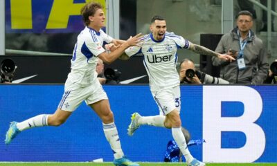 Como's Lucas Da Cunha celebrates after scoring his side's second goal during the Italian Cup, return-leg soccer match between Inter Milan and Como, in Milan, Italy, Tuesday, April 21, 2026. (AP Photo/Luca Bruno)