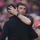 Bournemouth's head coach Andoni Iraola hugs Arsenal's manager Mikel Arteta, left, after the Premier League soccer match between Arsenal and Bournemouth in London, England Saturday, April 11, 2026. (AP Photo/Dave Shopland)