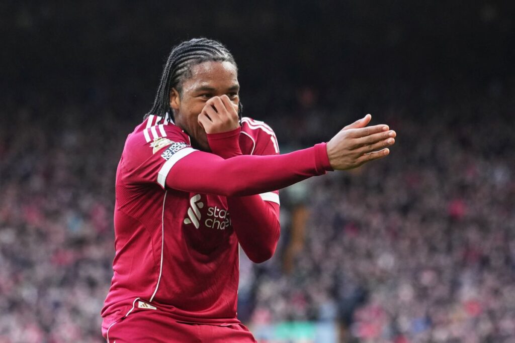 Liverpool's Rio Ngumoha celebrates after scoring his side's opening goal during the English Premier League soccer match between Liverpool and Fulham in Liverpool, England, Saturday, April 11, 2026. (AP Photo/Jon Super)
