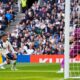 Brighton and Hove Albion's Kaoru Mitoma, left, scores their side's first goal of the game during their English Premier League soccer match against Tottenham in London, Saturday, April 18, 2026. (Jordan Pettitt/PA via AP)