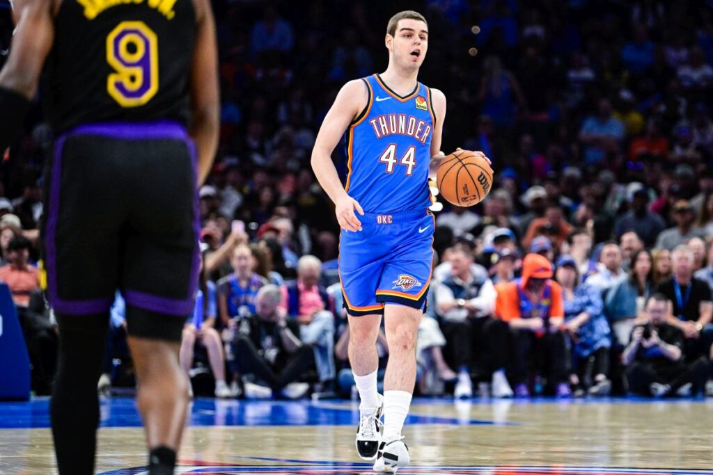 Oklahoma City Thunder guard Nikola Topić (44) drives the ball during the second half of an NBA basketball game against the Los Angeles Lakers Thursday, April. 2, 2026, in Oklahoma City. (AP Photo/Gerald Leong)