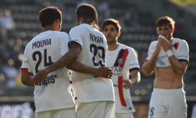 PSG's Senny Mayulu, left, celebrates with his teammates after scoring his side's second goal during the French League One soccer match between Angers and Paris Saint-Germain in Angers, western France, Saturday, April 25, 2026. (AP Photo/Mathieu Pattier)