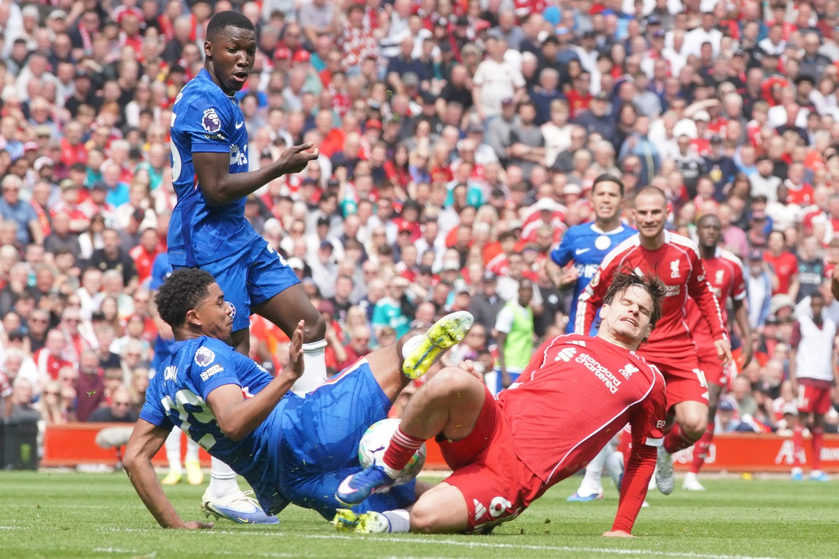 Chelsea's Wesley Fofana, left, and Liverpool's Milos Kerkez fight for the ball during the Premier League soccer match between Liverpool and Chelsea in Liverpool, England, Saturday, May 9, 2026. (AP Photo/Ian Hodgson)