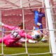 Bayer's Aleix Garcia scores during the German Bundesliga soccer match between Bayer Leverkusen and VfB Stuttgrat, in Stuttgart, Germany, Saturday, May 9, 2026. (Tom Weller/dpa via AP)
