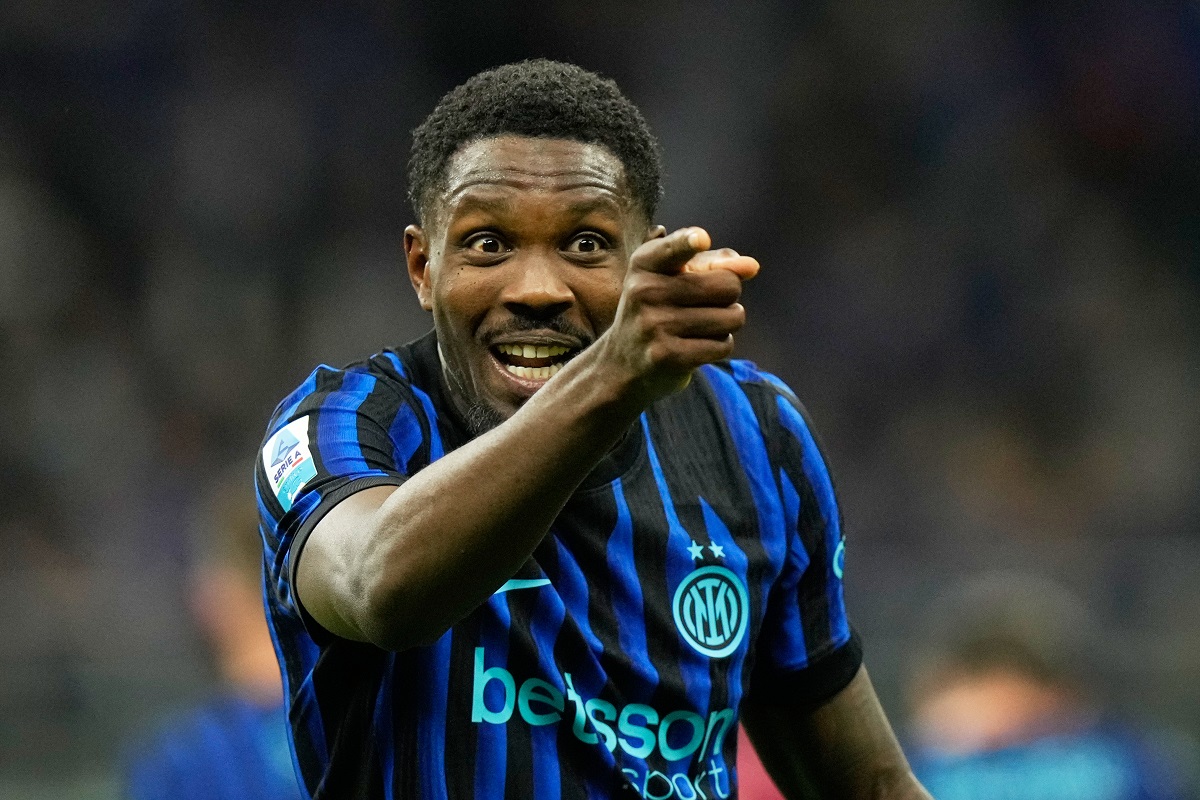 Inter Milan's Marcus Thuram celebrates after scoring his side's opening goal during a Serie A soccer match between Inter Milan and Parma, in Milan, Italy, Sunday, May 3, 2026. (AP Photo/Luca Bruno)