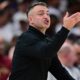 Toronto Raptors head coach Darko Rajakovic gives instructions from the bench during the second half in Game 5 of a first-round NBA playoffs basketball series against the Cleveland Cavaliers, Wednesday, April 29, 2026, In Cleveland. (AP Photo/David Dermer)
