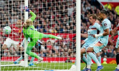 Brentford's goalkeeper Caoimhin Kelleher fails to save first goal during the Premier League soccer match between Manchester United and Brentford in Manchester, England, Monday, April 27, 2026. (AP Photo/Dave Thompson)