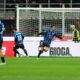 Atalanta's Davide Zappacosta, second right, celebrates with teammates after scoring his side's second goal during the Serie A soccer match between AC Milan and Atalanta, in Milan, Italy, Sunday, May 10, 2026. (AP Photo/Antonio Calanni)