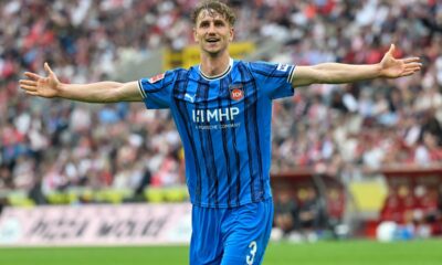 Germany Bundesliga Soccer Heidenheim's Jan Schöppner celebrates after scoring his side's third goal during the Bundesliga soccer match between 1. FC Köln and 1. FC Heidenheim, in Cologne, Germany, Sunday, May 10, 2026. (Ulrich Hufnagel/dpa via AP)