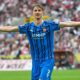 Germany Bundesliga Soccer Heidenheim's Jan Schöppner celebrates after scoring his side's third goal during the Bundesliga soccer match between 1. FC Köln and 1. FC Heidenheim, in Cologne, Germany, Sunday, May 10, 2026. (Ulrich Hufnagel/dpa via AP)