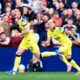 Tottenham's Conor Gallagher, left, celebrates scoring their side's first goal during the English Premier League soccer match between Aston Villa and Tottenham Hotspur in Birmingham, England, Sunday, May 3, 2026. (Nigel French/PA via AP)