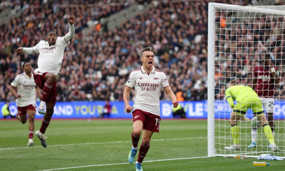 Arsenal's Leandro Trossard celebrates after scoring during the Premier League soccer match between West Ham and Arsenal in London, Sunday, May 10, 2026. (AP Photo/Ian Walton)