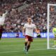 Arsenal's Leandro Trossard celebrates after scoring during the Premier League soccer match between West Ham and Arsenal in London, Sunday, May 10, 2026. (AP Photo/Ian Walton)