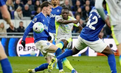 Manchester City's Jeremy Doku scores during the Premier League soccer match between Manchester City and Everton in Liverpool, England, Monday, May 4, 2026. (AP Photo/Dave Thompson)