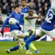 Manchester City's Jeremy Doku scores during the Premier League soccer match between Manchester City and Everton in Liverpool, England, Monday, May 4, 2026. (AP Photo/Dave Thompson)