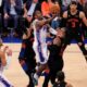 Philadelphia 76ers guard Tyrese Maxey (0) shoots over New York Knicks guard Jalen Brunson (11) during the second half of Game 2 in a second-round NBA basketball playoffs series, Wednesday, May 6, 2026, in New York. (AP Photo/Yuki Iwamura)