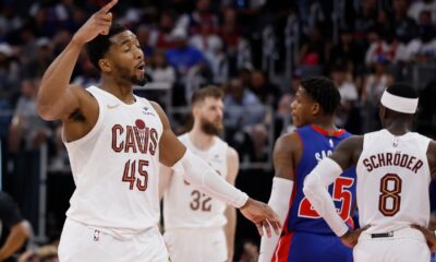 Cleveland Cavaliers guard Donovan Mitchell (45) celebrates as he walks off the court during the fourth quarter of Game 7 in a second-round NBA basketball playoffs series against the Detroit Pistons, Sunday, May 17, 2026, in Detroit. (AP Photo/Duane Burleson)